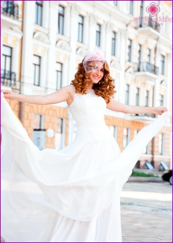 Bride with pink veil