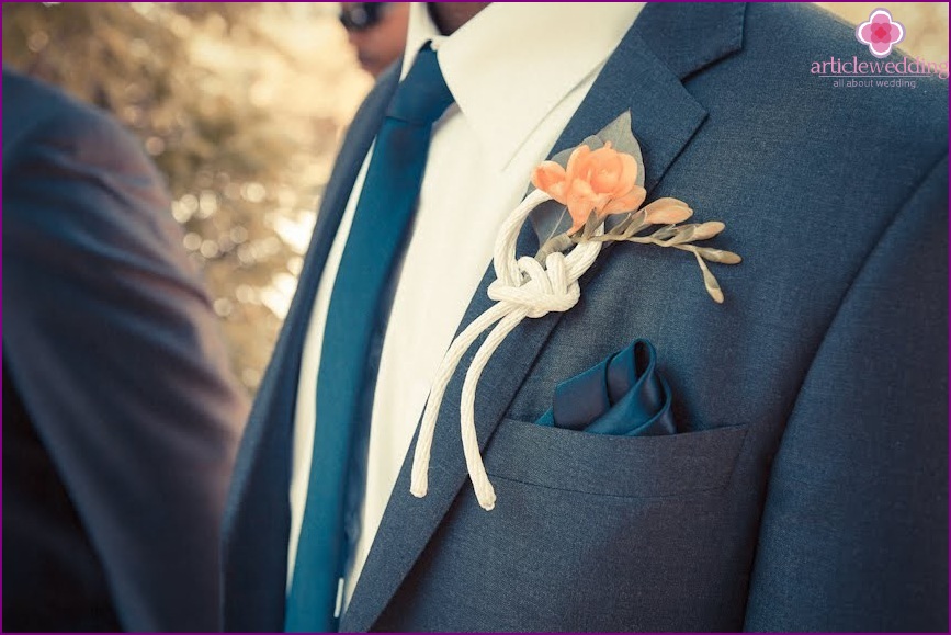 Buttonhole with flowers and nautical knot