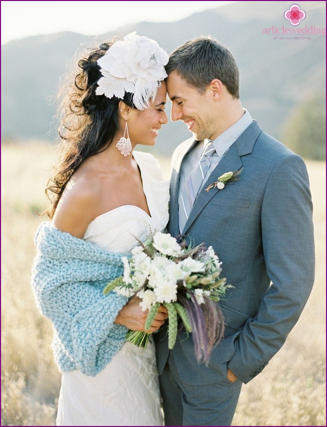Knitted scarf in the image of a bride
