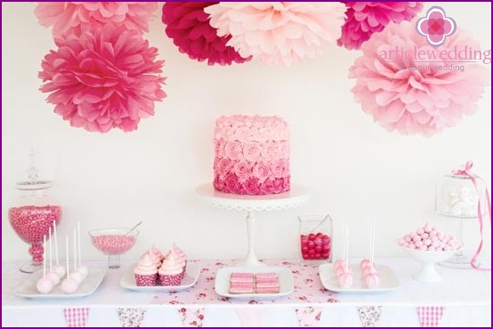 Crepe paper pompons in candy bar decor