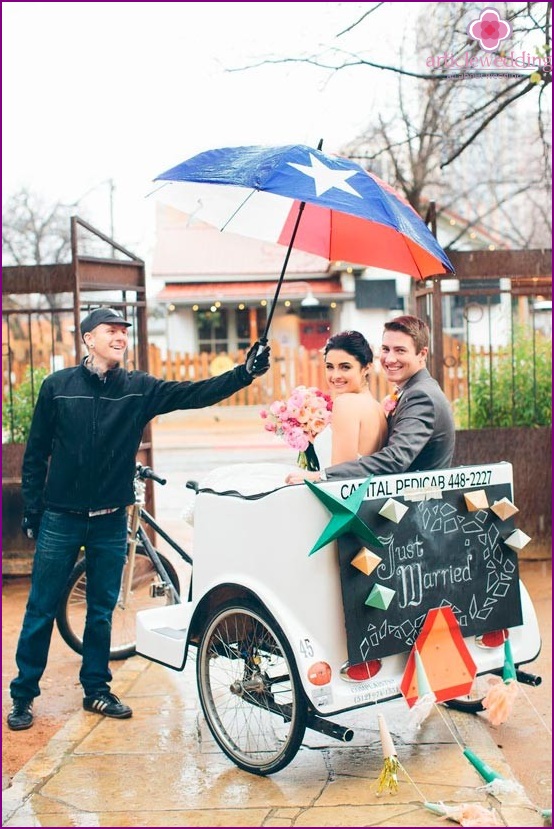 Hide from the rain at a wedding under an umbrella