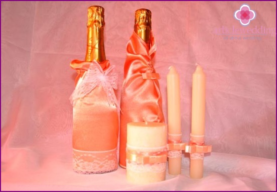 Decoration of candles and bottles for a wedding table