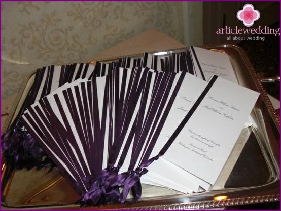 Ribbons in the decor of wedding programs