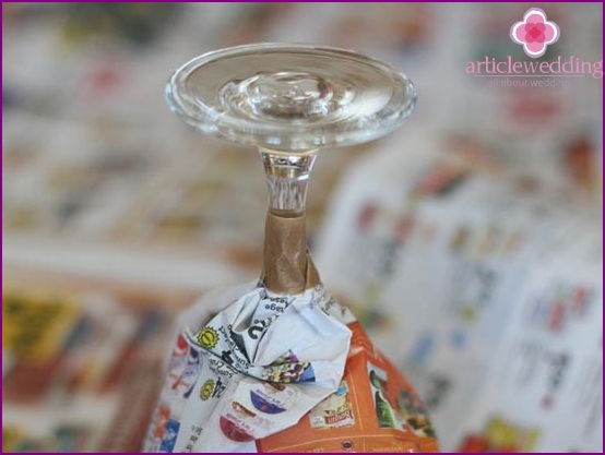 Wrap a glass with newspapers