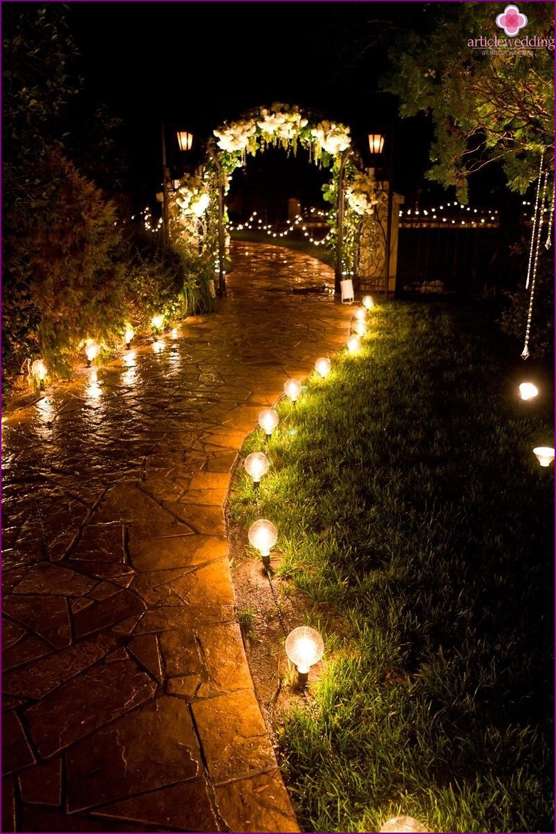 A candlelit road at a wedding