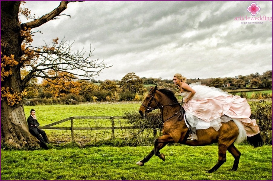 Cheeky bride riding a horse
