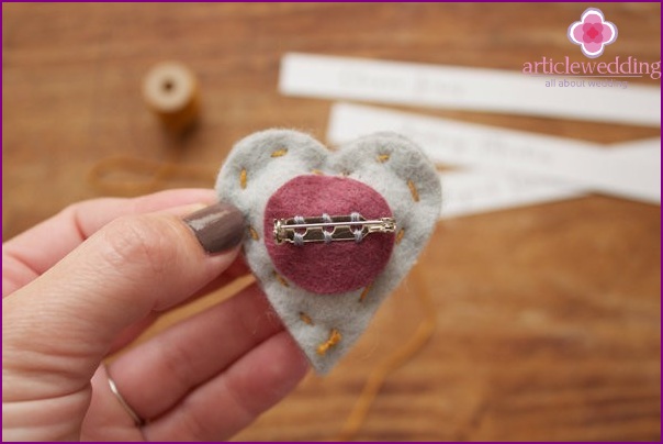 Sew pins to the hearts