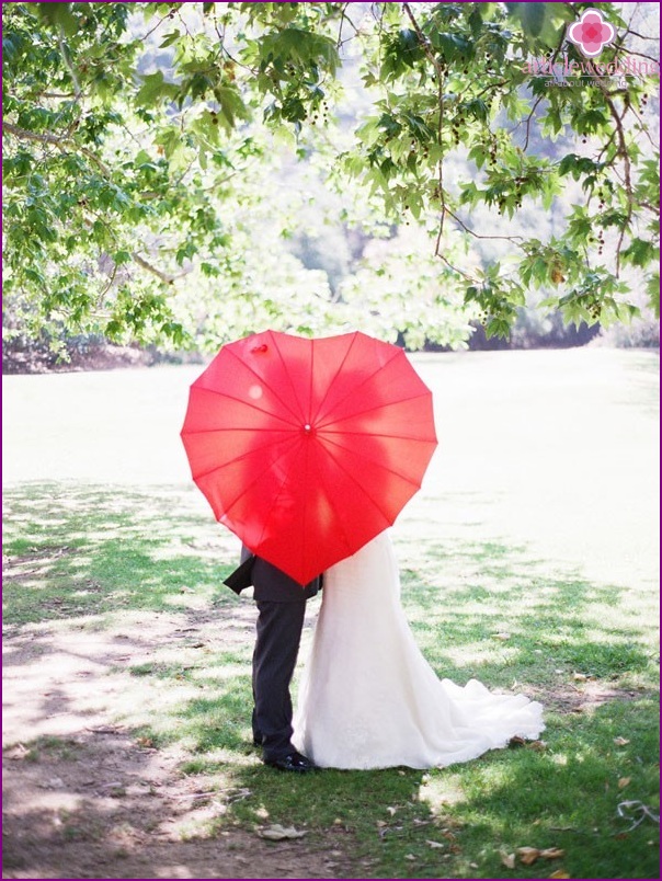 Red umbrella for a photo shoot