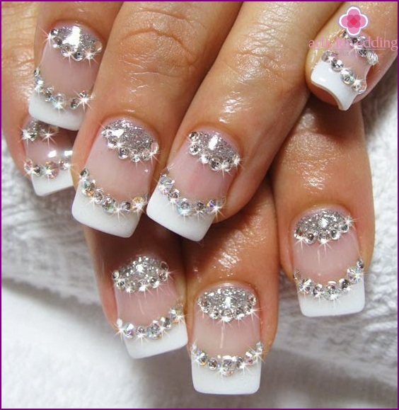 Rhinestones in manicure