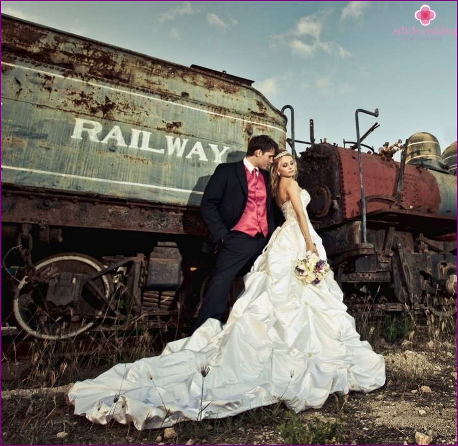 Newlyweds on the railway tracks
