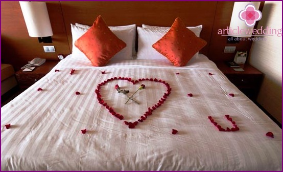 Bed with rose petals