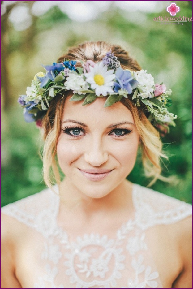 Stylish wreath of fresh flowers