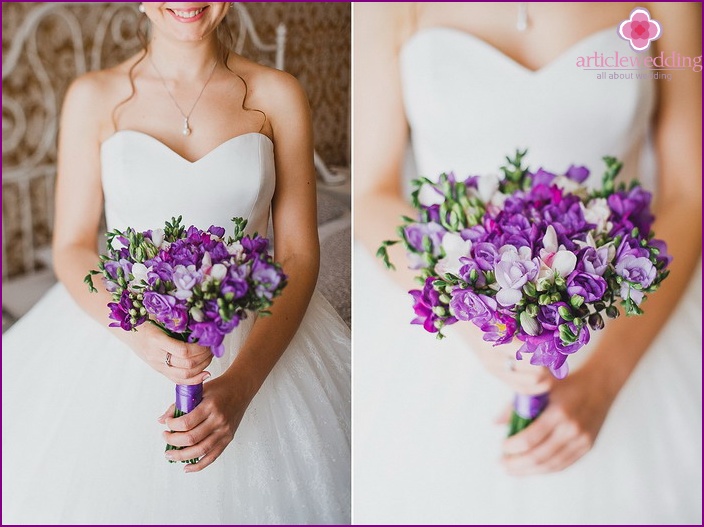 Live purple freesia in a newlywed bouquet