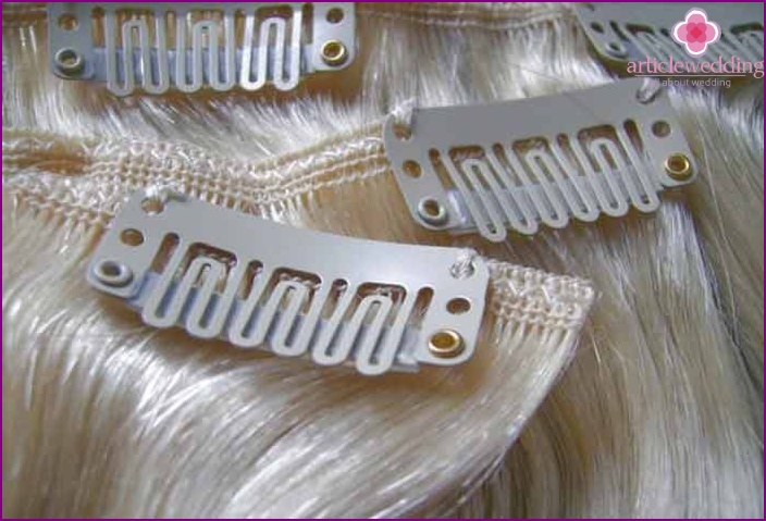 False locks on hairpins in a wedding hairstyle
