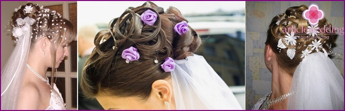 Coiffure avec voile complétée par des fleurs