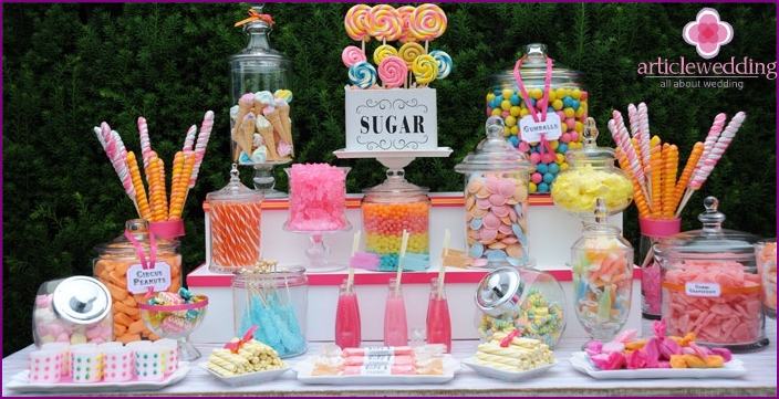 Children's table at the wedding is decorated brightly