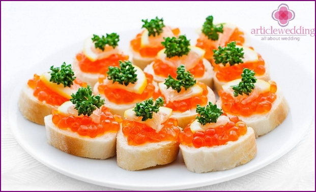 Holiday sandwiches with red caviar