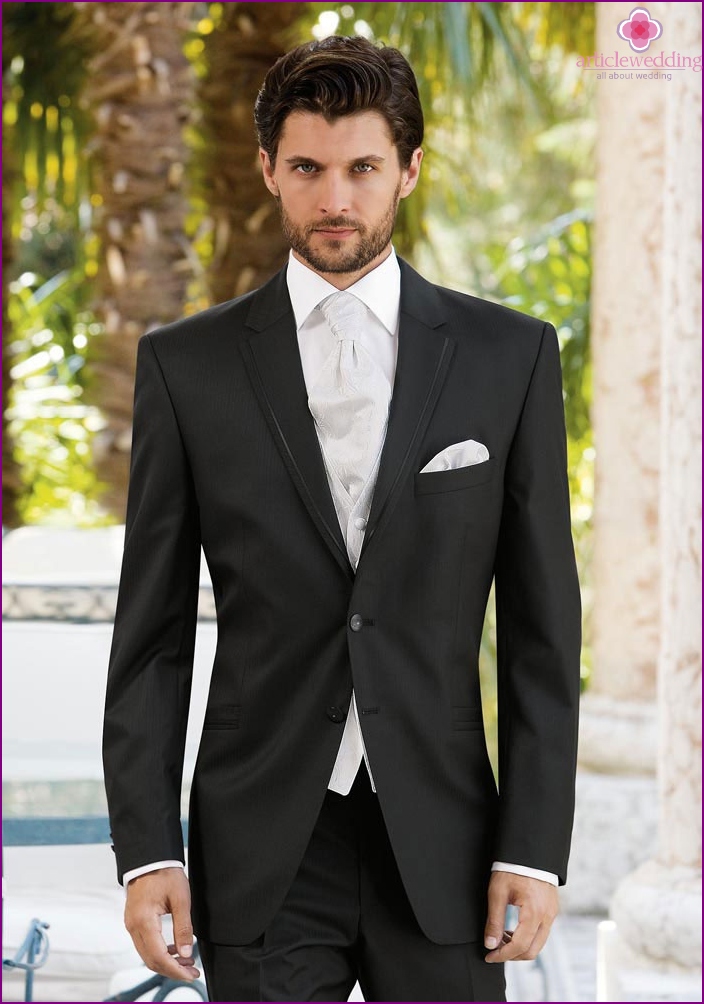 Strict dark tailcoat for a man for a wedding