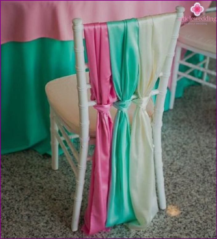 Ribbons look perfect on plastic chairs