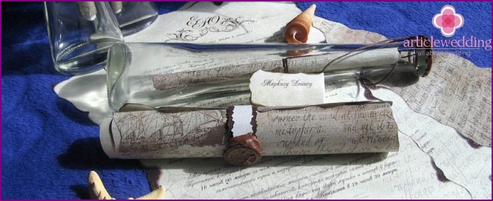 Wedding invitation in a scroll with nautical motifs