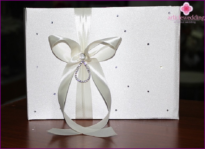 Wishes book decoration with satin ribbon