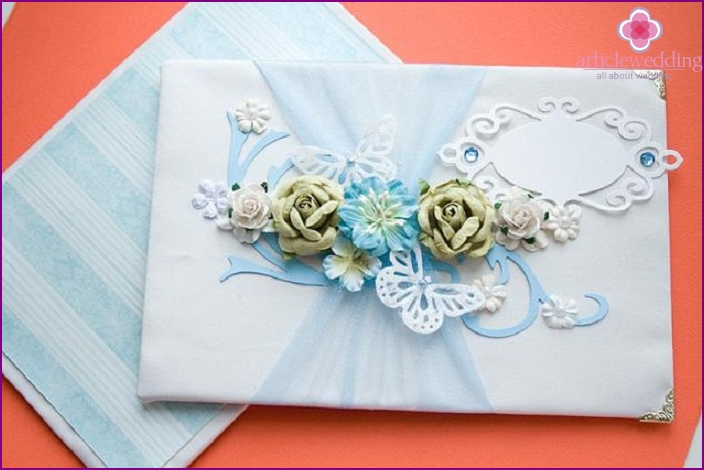 Flowers on the book of wedding wishes