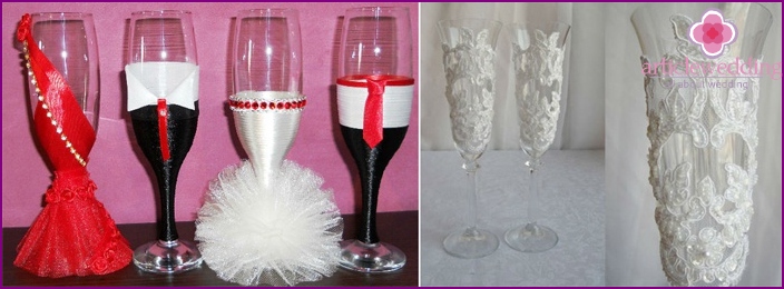 Wedding glasses decorated with satin ribbons and lace