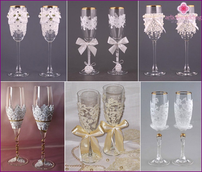 Decoration of wine glasses for a wedding lace