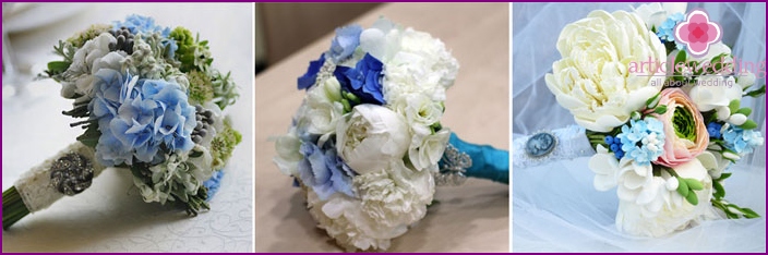 The decor of the newlywed's floral arrangement: brooch on a ribbon