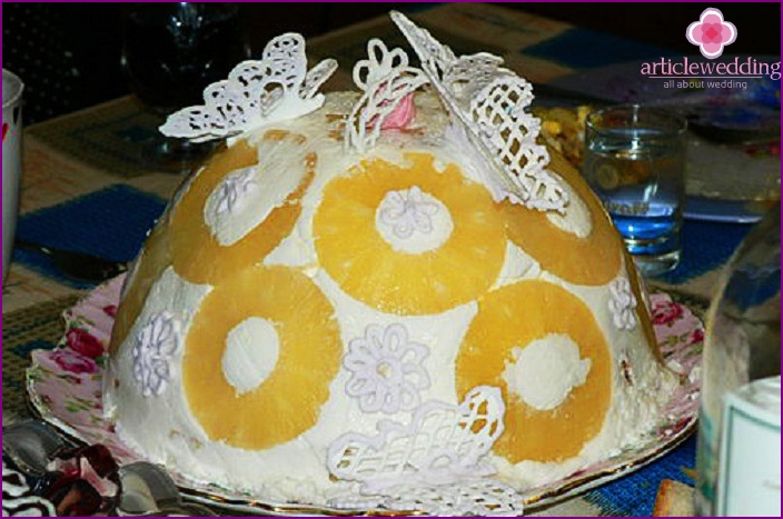 Openwork decorations on a white icing cake