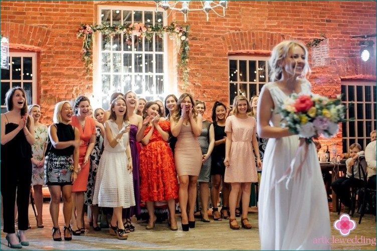 The bride throws a understudy bouquet
